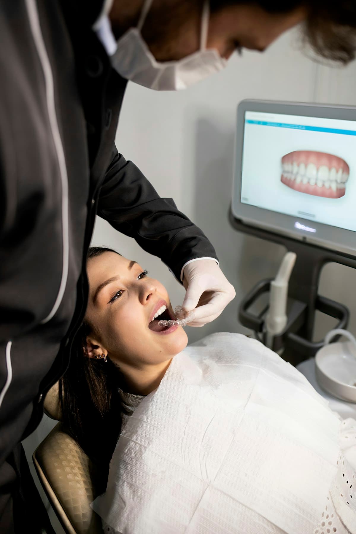 Dentist consulting with a patient