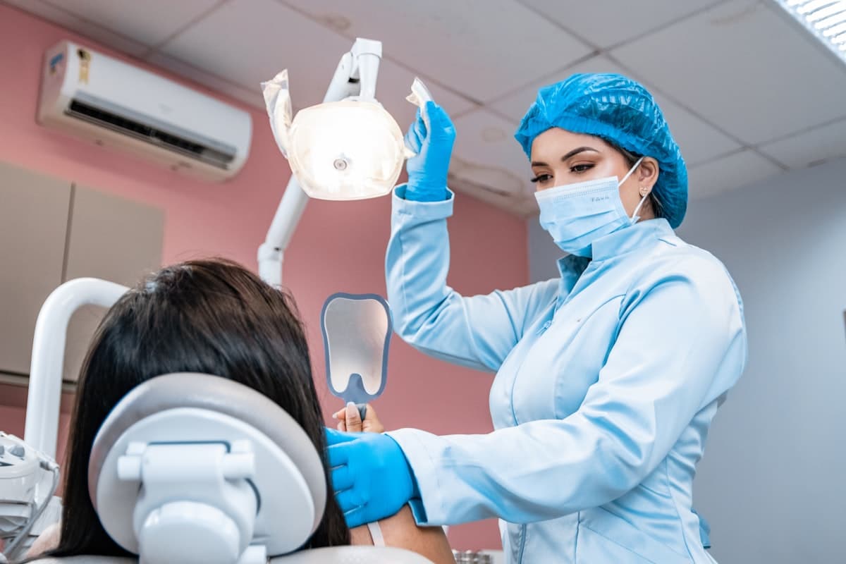 Dentist providing attentive patient care