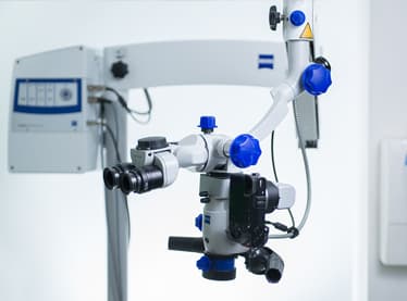 Microscope-assisted hospital-grade dental procedure